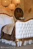 Antique Gold & Tufted White Bed